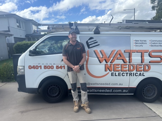 Photo of Nathan in front of Watts Needed Electrical van
