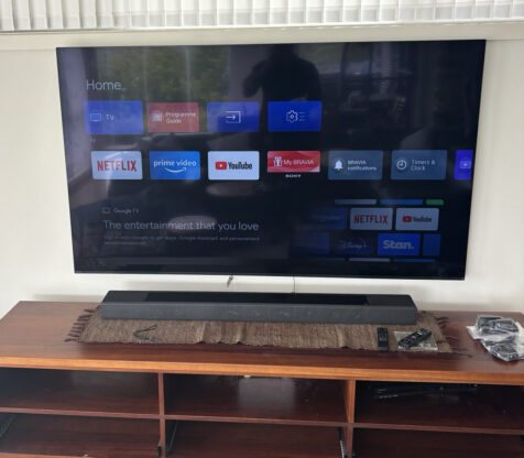 Installation of a television in Canberra, showcasing clean cable management.