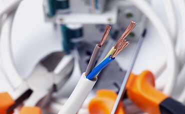 Exposed wires showing risk of electrical harm